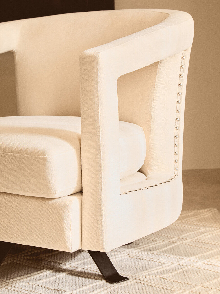 Hestia Beige Velvet Swivel Chair with Matte Black Base