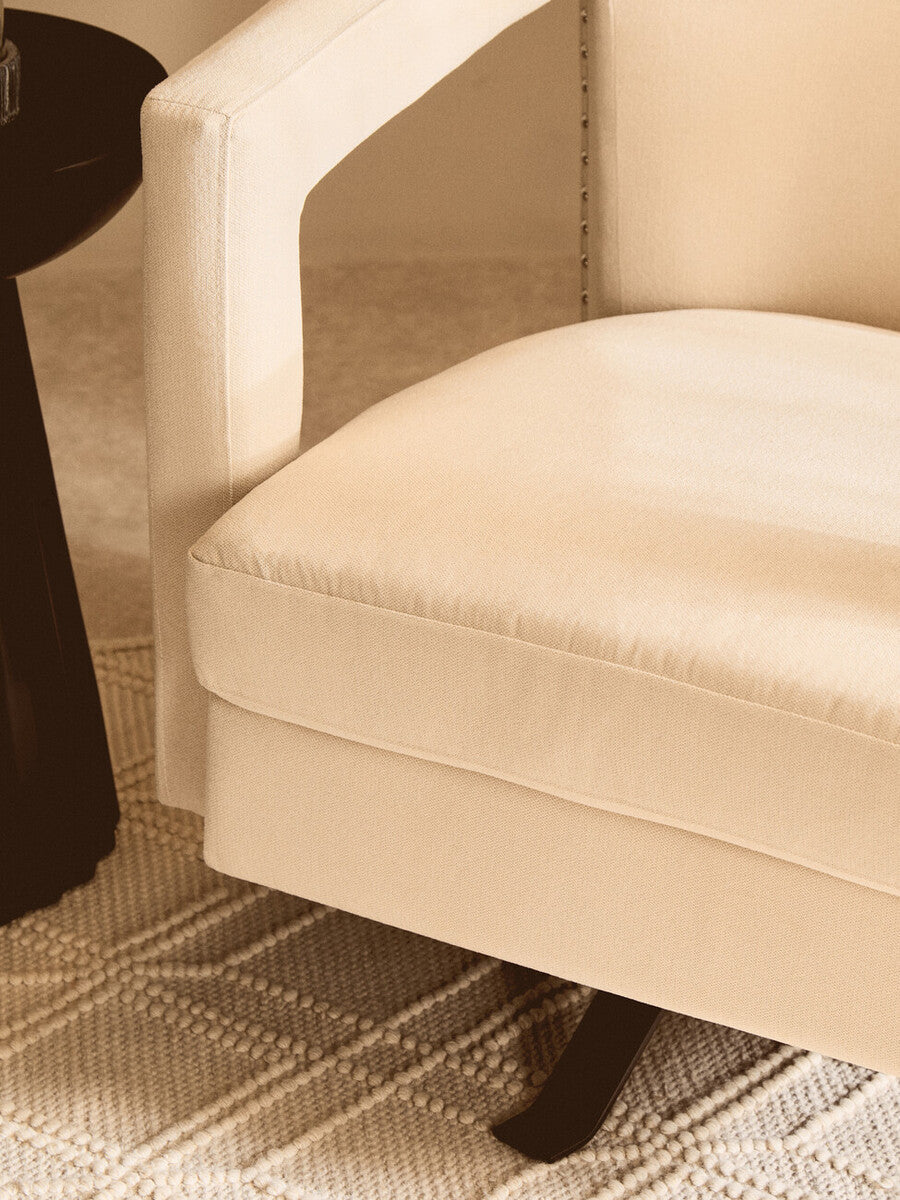 Hestia Beige Velvet Swivel Chair with Matte Black Base