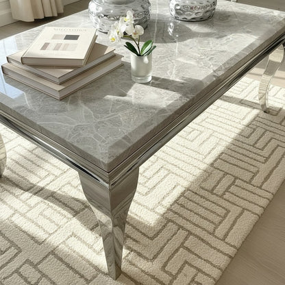 Luxury Lorens 130cm Chrome Coffee Table With Light Grey Marble Top And Curved Leg Design