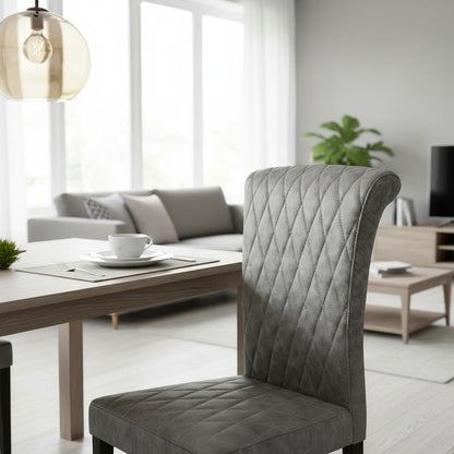 Luxury Niklas Black Faux Leather Dining Chair With Chrome Curved Legs