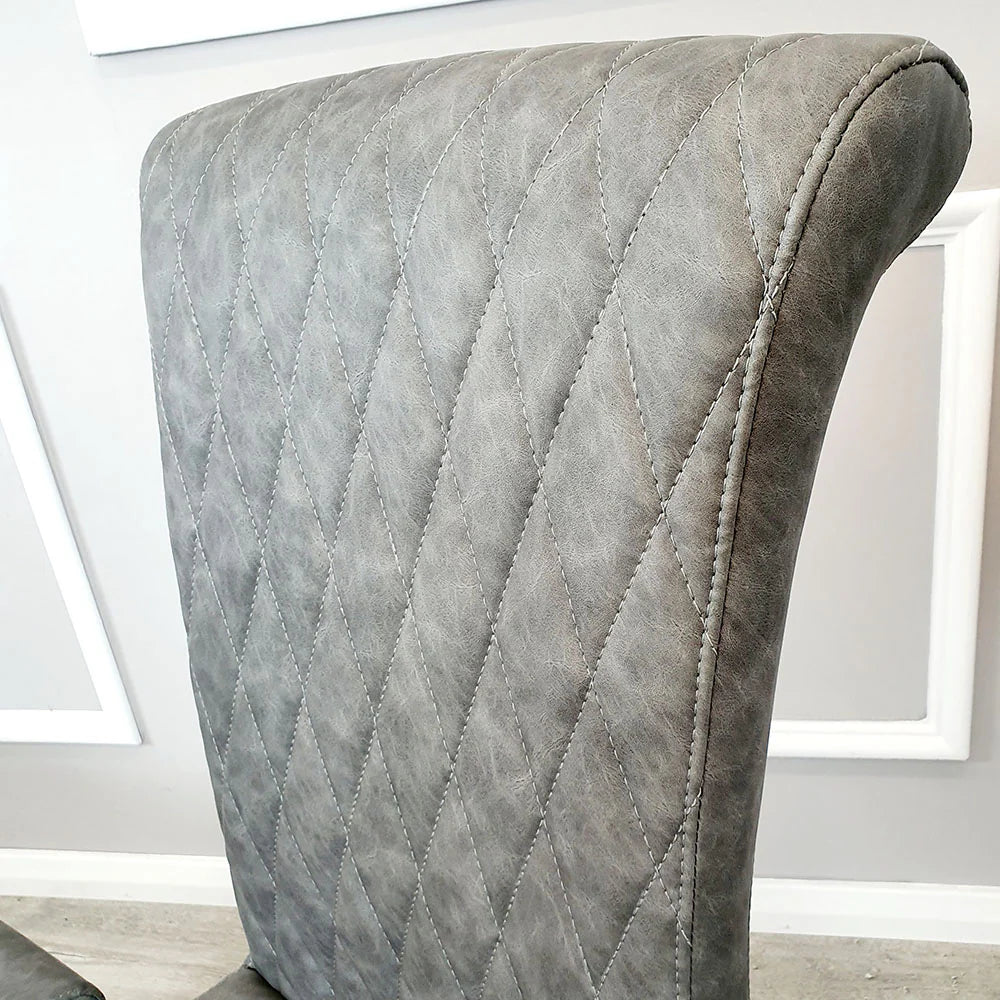 Luxury Niklas Black Faux Leather Dining Chair With Chrome Curved Legs