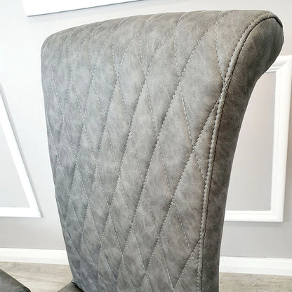 Luxury Niklas Black Faux Leather Dining Chair With Chrome Curved Legs