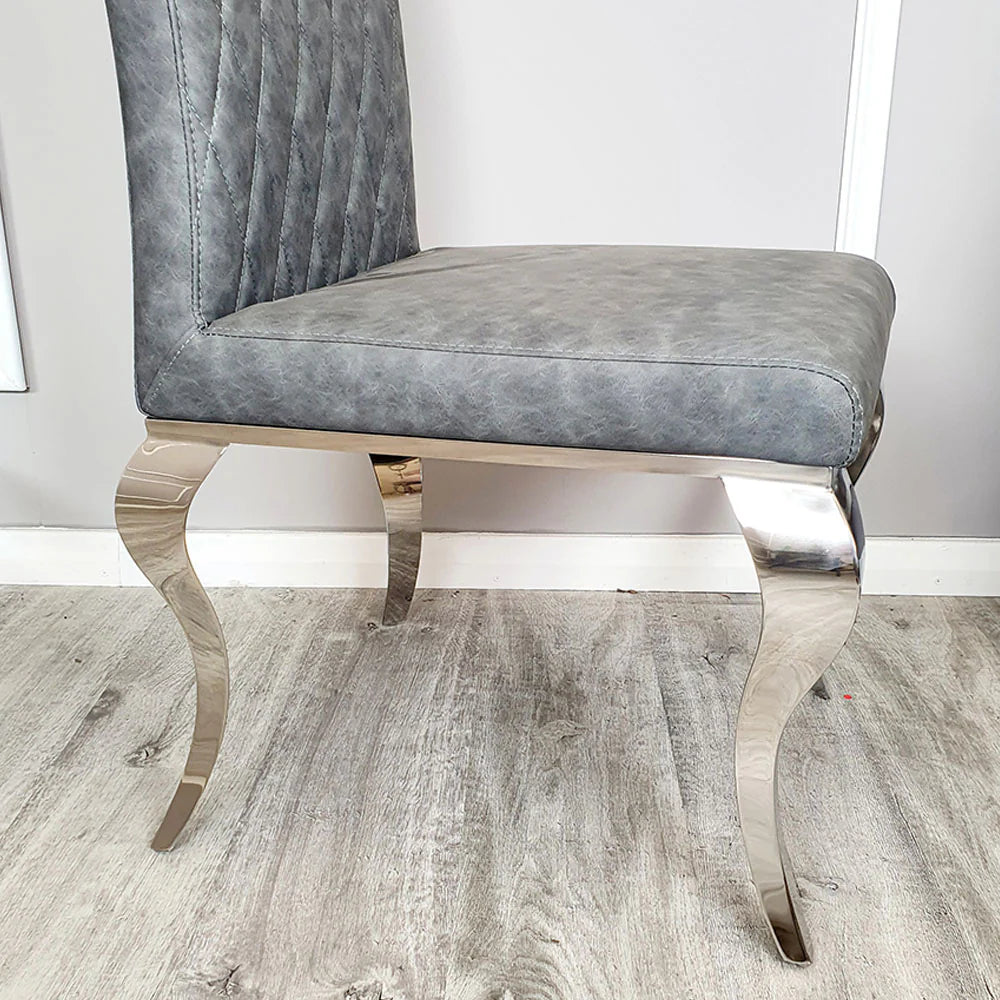 Luxury Niklas Black Faux Leather Dining Chair With Chrome Curved Legs