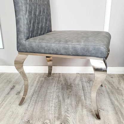 Luxury Niklas Black Faux Leather Dining Chair With Chrome Curved Legs